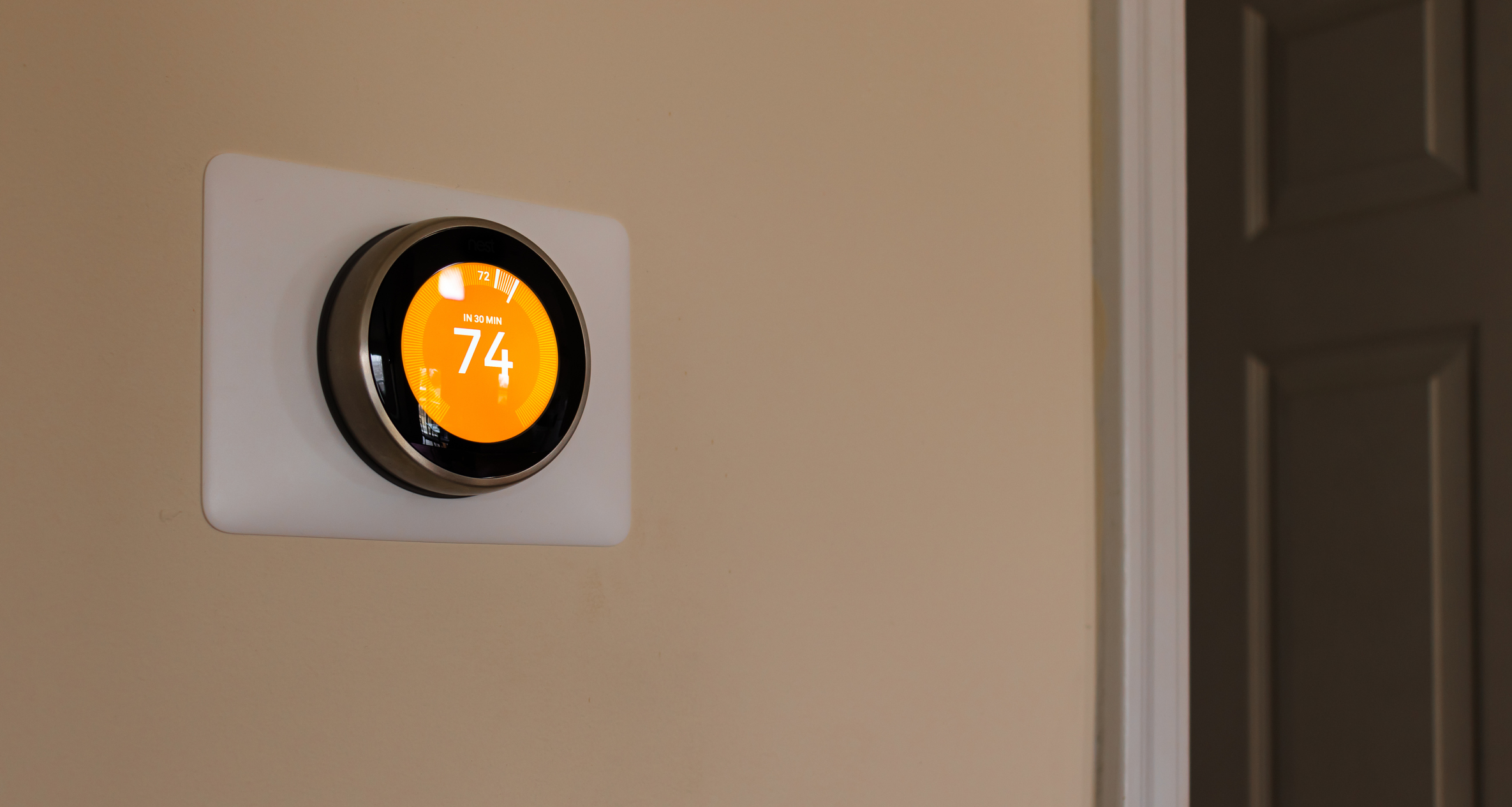 Smart thermostat inside home