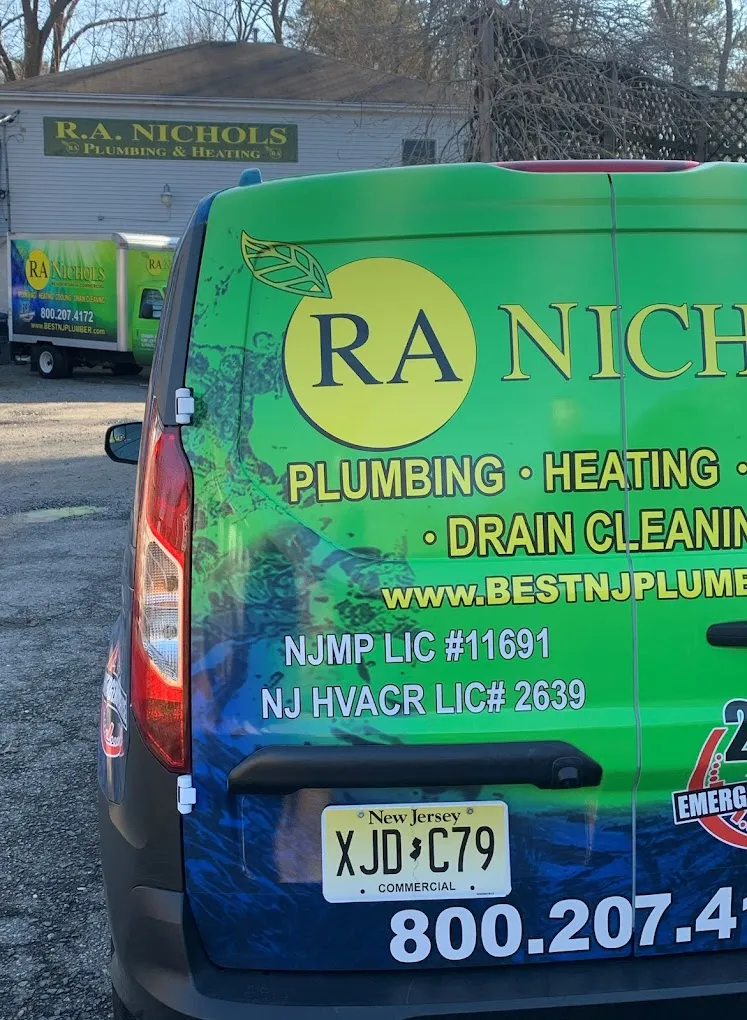 A vibrant van wrap design featuring plumbing tools and company logo