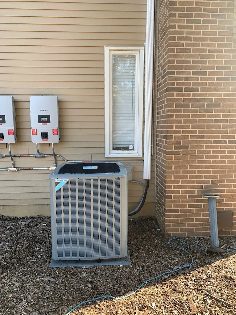 Air conditioning unit located outside a home